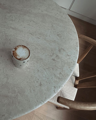 Lulu Cup on a travertine table as an interior design detail and basic for your healthy Everyday